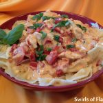 Creamy Tomato Basil Chicken & Pasta combines pasta, chicken, tomatoes, a cheesy pasta sauce and fresh basil for an easy weeknight dinner recipe. A store bought creamy pasta sauce turns Creamy Tomato Basil Chicken & Pasta into a time saving recipe that will be a family favorite! #pasta #creamsauce #tomatoes #sundriedtomatoes #plumtomatoes #chicken #easyrecipe #weeknightdinner #entertaining #familyfavorite #swirlsofflavor