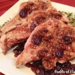 pork chops with cherry sauce and fresh herbs