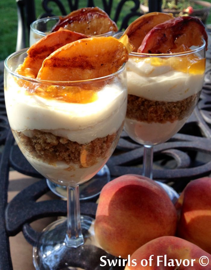 Grilled Peach Cheesecake Parfaits is an easy no-bake recipe for a summer dessert. A no-bake cheesecake mousseÂ parfait topped with grilled fresh peaches fromÂ the farmers market will be a delicious ending to your summer meal! no bake | dessert | peach | summer fruit | easy recipe | cheesecake | cheesecake mousse | #swirlsofflavor