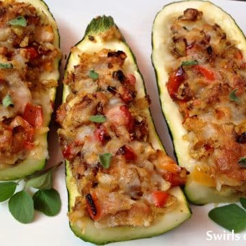 Cheesy Stuffed Zucchini are filled with peppers, onions, cheese and breadcrumbs, making them ideal for your Meatless Monday meal. Want to try another zucchini noodle recipe.