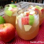 Apple Cider Sangria is an easy recipe that adds a fall spin to your sangria! Apple cider, applejack brandy and a sweet white wine combine with a hint of vanilla to create your new favorite fall cocktail!