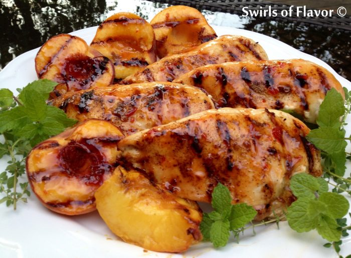 Grilled Chipolte Chicken "N Peaches combine the sweetness of peaches with a hint of chipotle chili pepper heat. A perfect combination of spicy sweetness! grilled | grilling | chicken | peaches | chipotle | barbecue | easy | fresh produce | dinner
