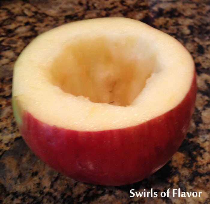 coring out an apple for baked apple filling