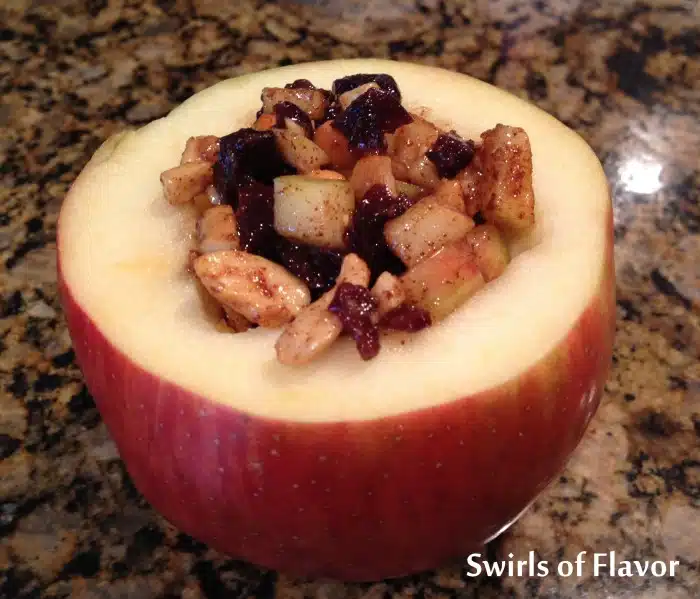 filling an apple for baked apples