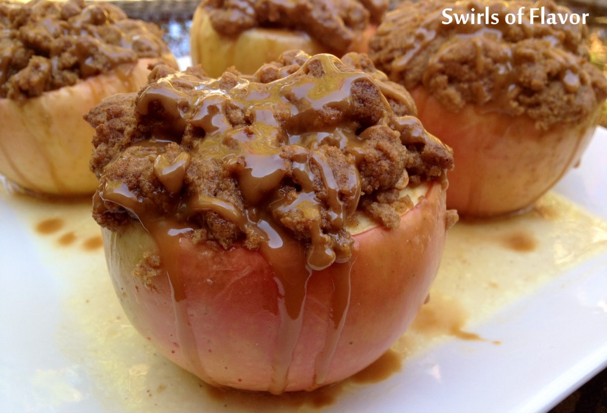 Baked apples with crumb topping and caramel drizzle