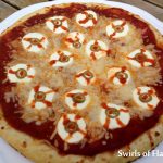 Kids will love a Bloody Eyeball Pizza after a long day of trick or treating! A spooky and delicious Halloween pizza! fun for kids | pizza | dinner | Halloween | snack