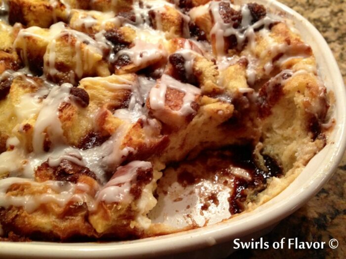 cinnamon bun bread pudding with scoop out
