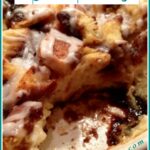 scoop out of a bread pudding casserole with text overlay