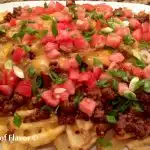 loaded waffle fries with ground beef and tomatoes