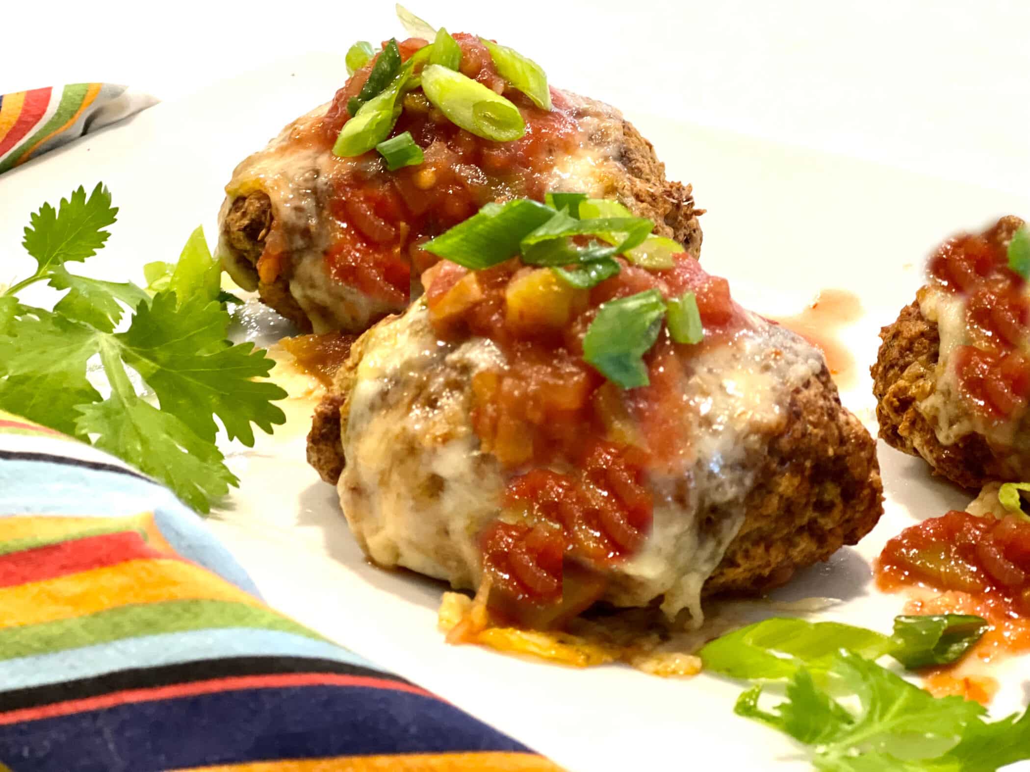 mini taco meatloaf with cheese and salsa