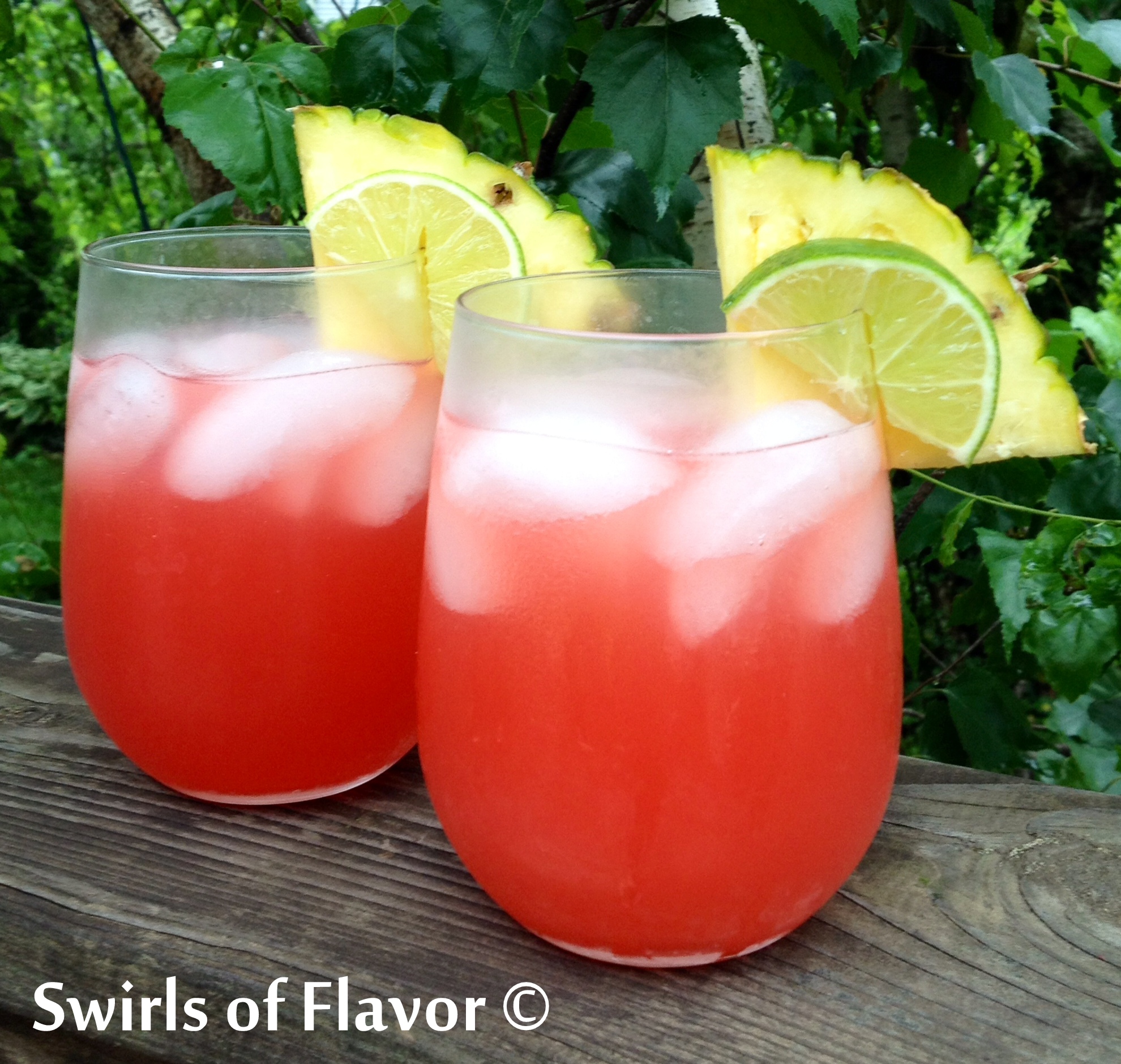 Caribbean Sunset Rum Cocktail - Swirls of Flavor