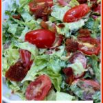 Chopped BLT Salad in white bowl with text overlay