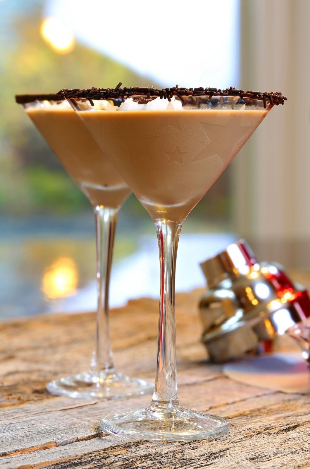 two martini glasses with chocolate martinis