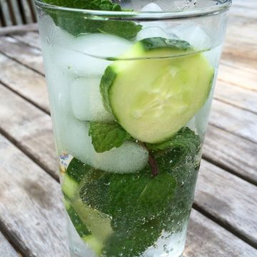 Cucumber Mint Vodka Refresher is an easy recipe that will quickly become a favorite summertime cocktail! Cool cucumber, fresh mint, vodka and seltzer combine for the perfect summer happy hour drink!