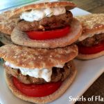 Greek Turkey Burgers with Tzatziki Sauce is an easy recipe for ground turkey burgers flavored with feta cheese and oregano and complimented with a cool cucumber, dill and red onion Tzatziki Sauce!