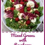 Raspberry Almond Mixed Greens with Raspberry Balsamic Vinaigrette is a blend of lettuces, toasted almonds and plump raspberries tossed in a balsamic vinaigrette sweetened with a hint of raspberry jam.