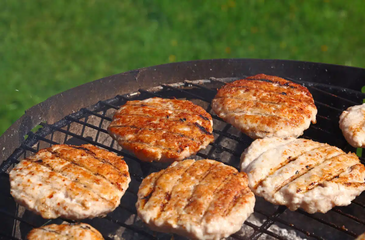 turkey burgers cooking on the grill