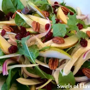 baby kale salad with pears and pecans