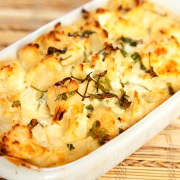 cauliflower casserole in a white baking dish