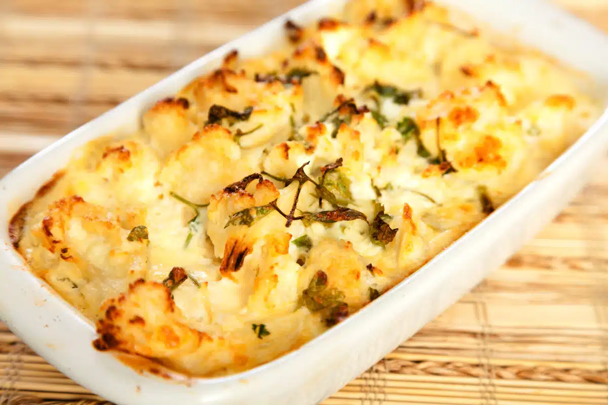 cauliflower casserole in a white baking dish