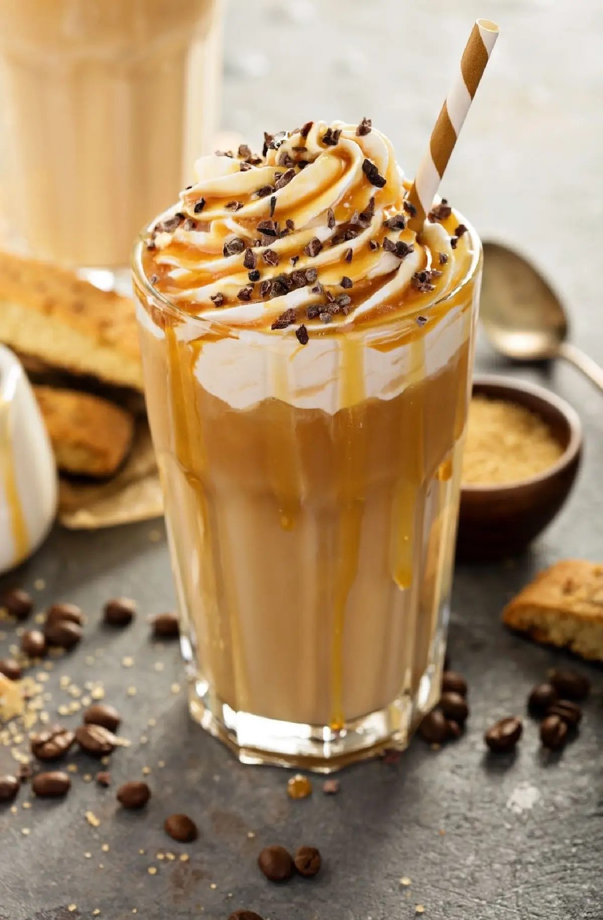 coffee milkshake with whipped topping and straw