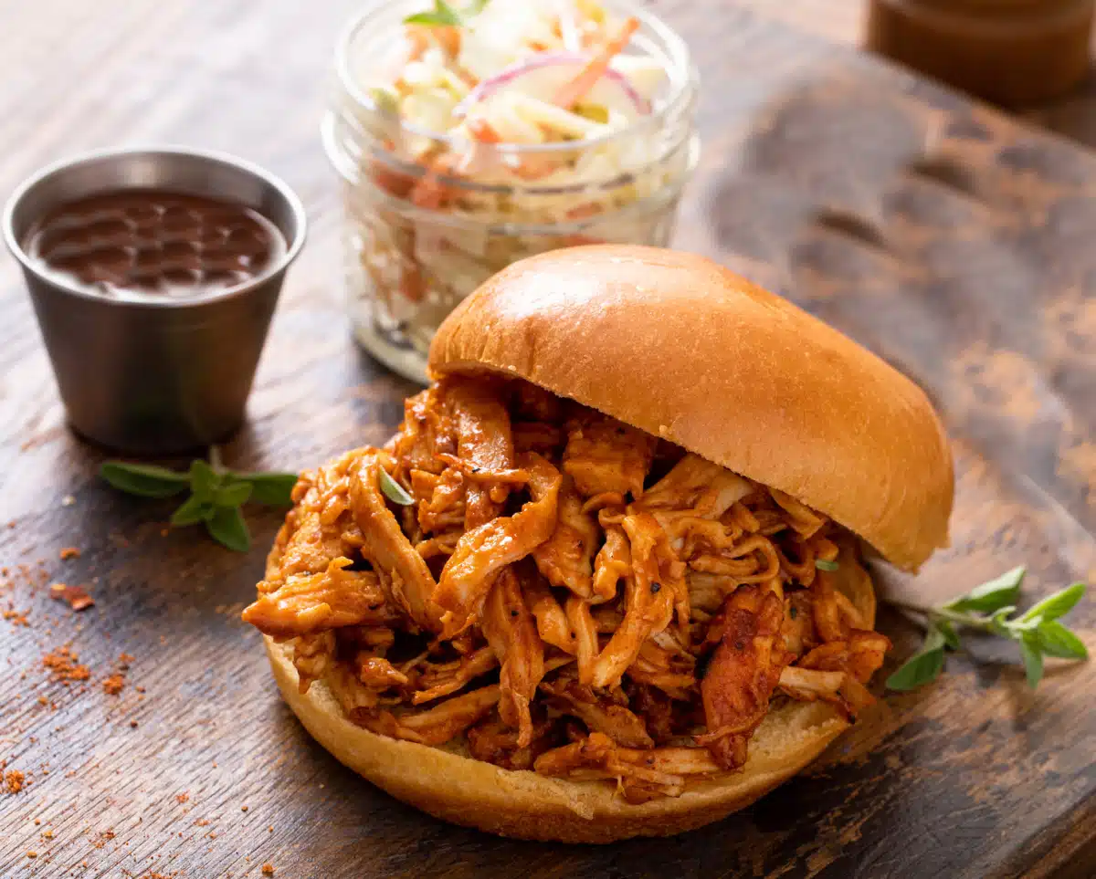 shredded buffalo chicken on a roll