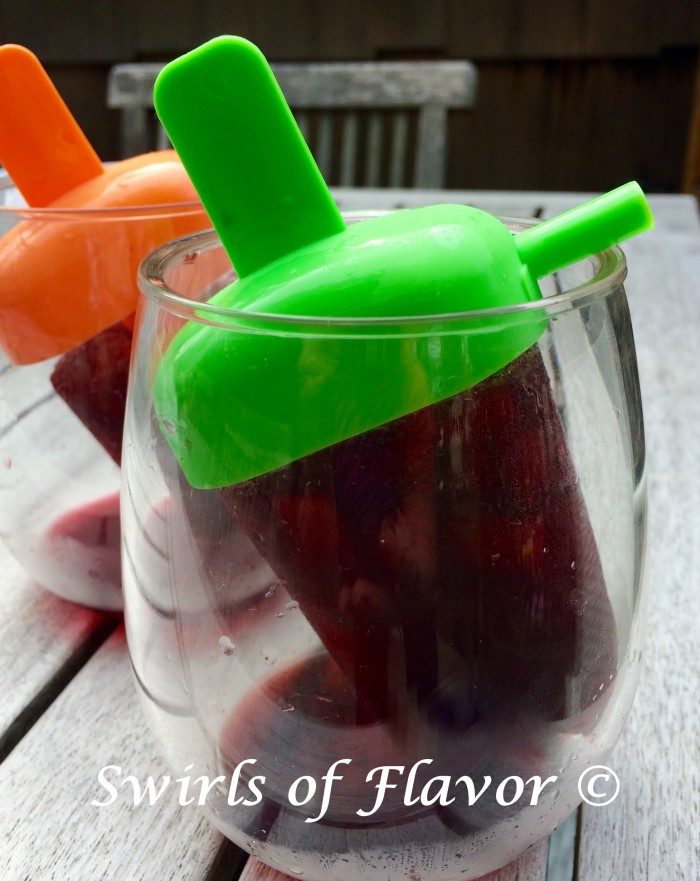 Pinot Noir, pomegranate juice and a fresh plum are all frozen to perfection in this easy winescicles recipe for Pomegranate Plum Wine Ice Pops!