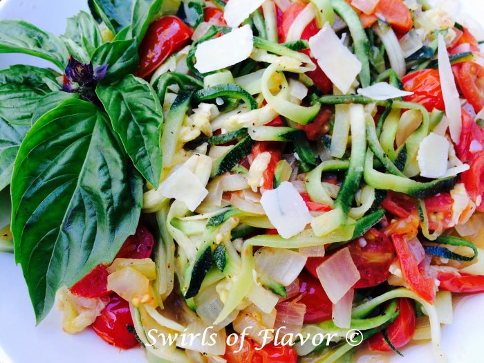 Zucchini Pasta Pomodoro is bursting with the summertime flavors of zucchini noodles, tomatoes and fresh basil. easy recipe | summer | zoodles | farmers market | pasta | vegetarian | Meatless Monday | dinner #swirlsofflavor