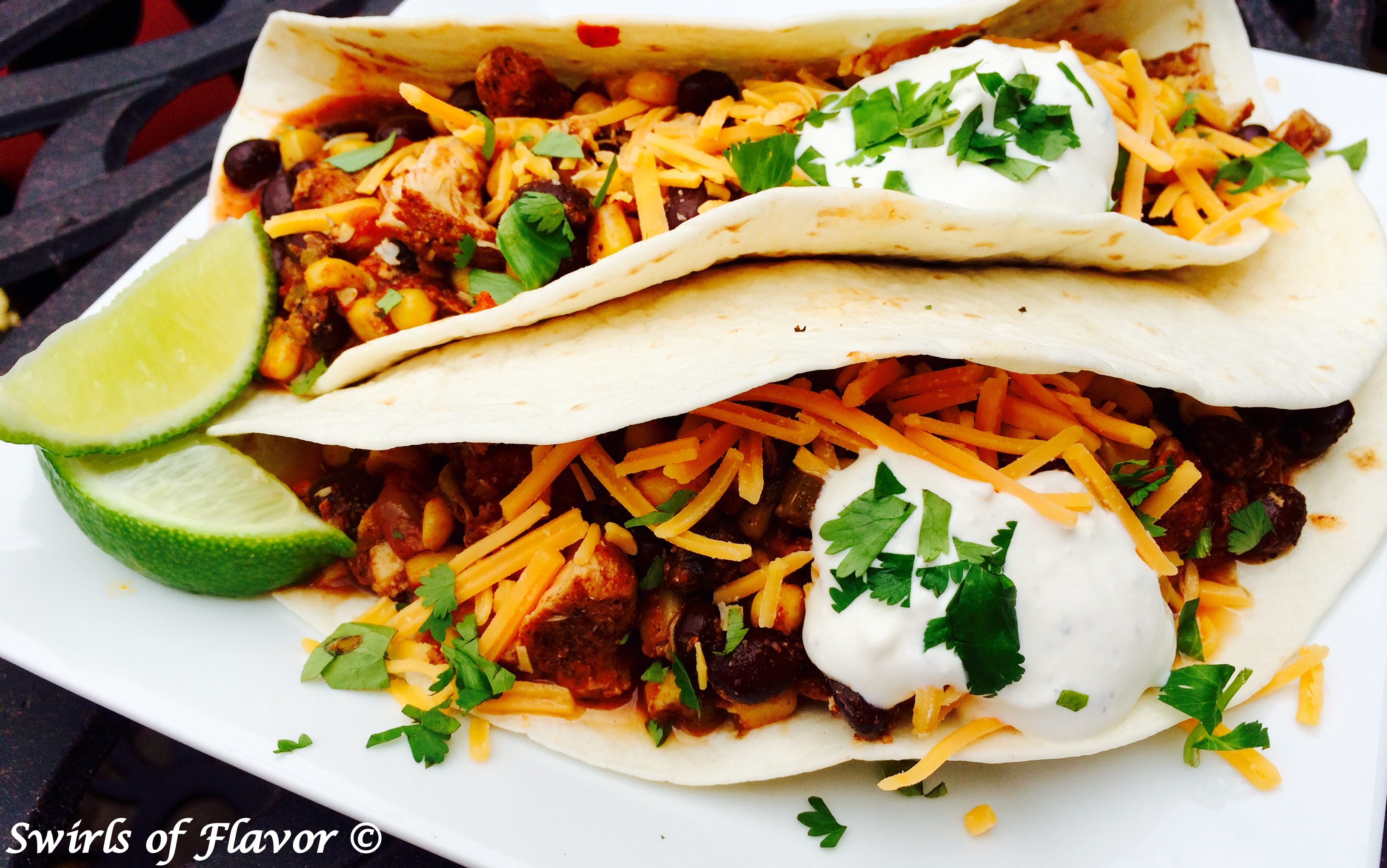 Chicken Chili in tortilla with cheese and sour cream