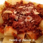 Best Ever Meat Sauce is a homemade pasta sauce that is ready in just 30 minutes and bursting with flavor. This easy meat sauce recipe is quick enough for a weeknight dinner and impressive enough for entertaining. #meatsauce #pastasauce #spaghettisauce #tomatosauce #gravy #pasta #easyrecipe #dinner #Italian #groundbeef #swirlsofflavor