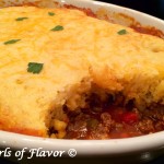 Chili Cornbread Bake is an easy recipe that will certainly become a family favorite. A saucy homemade chili is smothered with a cheesy creamy cornbread topping and baked until hot, bubbly and golden! The perfect comfort food dinner on a chilly evening. #chili #homemadechili #cornbread #bake #casserole #familyfavorite #comfortfood #easyrecipe #dinner #swirlsofflavor