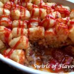 Cheeseburger Tater Tot Casserole with scoop out