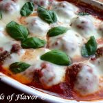 Baked Meatballs Parmesan, an easy homemade meatball recipe that's cheesy and saucy, will warm you up for dinner tonight! Just shape our homemade beef mixture into meatballs, smother with sauce and let them bake themselves in the oven. #meatballs #homemademeatballs #meatballsparmesan #easyrecipe #dinner #ovenbakedmeatballs #casserole #swirlsofflavor
