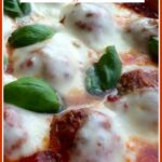 baked meatballs with fresh basil and cheese and text overlay