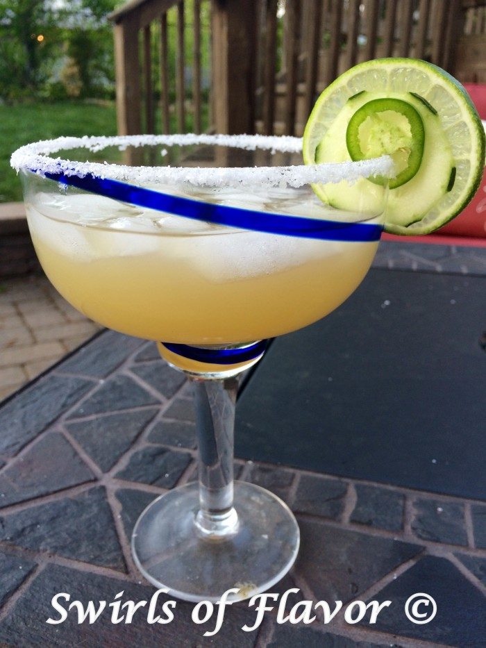 Jalapeno Cucumber Margaritas are a twist on the classic margarita cocktail. Spicy jalapenos and refreshing cucumbers flavor a margarita mixture lending the perfect balance of heat and coolness to our easy margarita recipe.