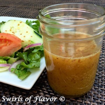Honey Mustard Salad Dressing is an easy to make homemade vinaigrette with just a few simple ingredients, honey, mustard, olive oil, apple cider vinegar, garlic and salt! This easy recipe is not just for salad but as a dipping sauce for vegetables, a marinade for chicken or fish or even as a dressing for your favorite pasta salad. #easyrecipe #homemadevinaigrette #homemadesaladdressing #saladressing #honeymustard #dijonmustard #marinade #dippingsauce #swirlsofflavor