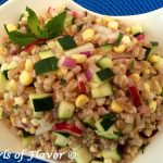 Fresh vegetables are tossed together with farro in a lime scented dressing making Zucchini & Corn Farro Salad a refreshing and nutritious easy summer side dish recipe. easy recipe | farro | farmers market | fresh vegetables | zucchini | corn on the cob | side dish | #swirlsofflavor