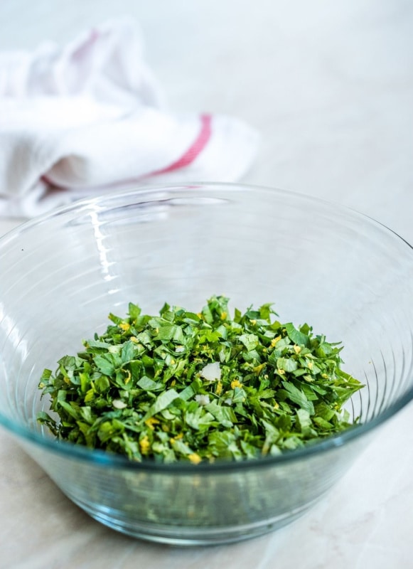 chopped gremolata in clear bowl