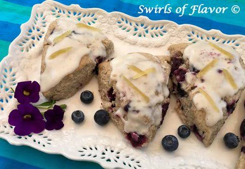 Ginger Glazed Blueberry Scones are the perfect way to savor the sweetness of juicy blueberry and tangy lemon together in an easy to make homemade sweet treat! Perfect for breakfast, brunch and even dessert!