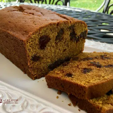 chocolate chip pumpkin bread with slices on white plate
