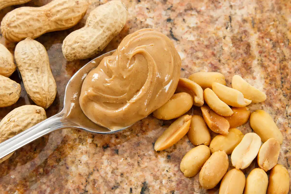 creamy peanut butter on a spoon