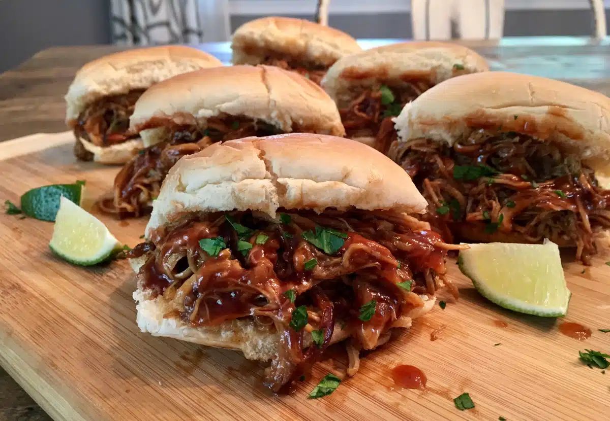 slow cooker garlic cola chicken on rolls