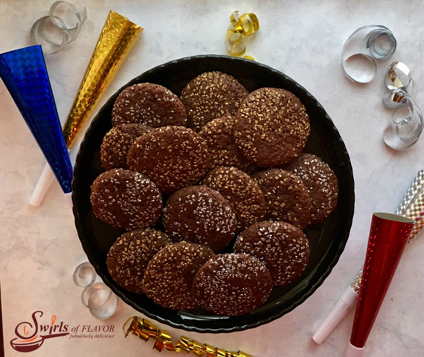 A simple chocolate cookie surrounded with twinkling sugars is easy to make and so impressive to serve as a holiday dessert. And we all know that glitter makes everything better!