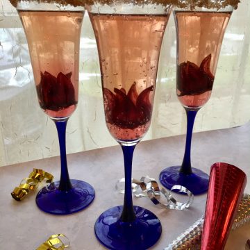 Welcome in 2017 with a dressed up sparkling cocktail! Edible wild hibiscus flowers unfurl as the bubbles in your glass fizz!