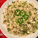 Jalapeno Lime Cauliflower Rice is a healthy cauliflower rice recipe bursting with the flavors of spicy jalapeno balanced with the freshness of chopped cilantro and lime juice! An easy recipe for a side side that can also be Whole30 with just one substitution. #cauliflower #cauliflowerrice #sidedish #vegetarian #vegetable #whole30 #easyrecipe #meatlessmonday #lowcarb #healthy #glutenfree #swirlsofflavor
