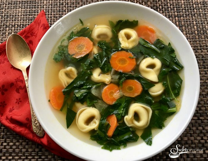 Grandma's Dandelion Soup is a sure sign that spring has arrived! Dandelion greens add nutrition and flavor to this homemade soup! dandelion | dandelion greens | soup | spring | spring recipe | tortellini