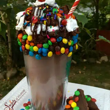 brownie milkshake with m&ms and whipped cream