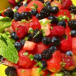 Jalapeno Lime Summer Fruit Salad is bursting with sweet juicy berries and watermelon, fresh mint, zesty lime and a hint of jalapeno heat! strawberry | blueberry | raspberry | blackberry | berry | watermelon | summer fruit | salad | brunch | picnic | barbecue | lime | mint | easy recipe | summer fruit | fruit salad | #swirlsofflavor