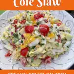 mango coleslaw in a bowl with text overlay