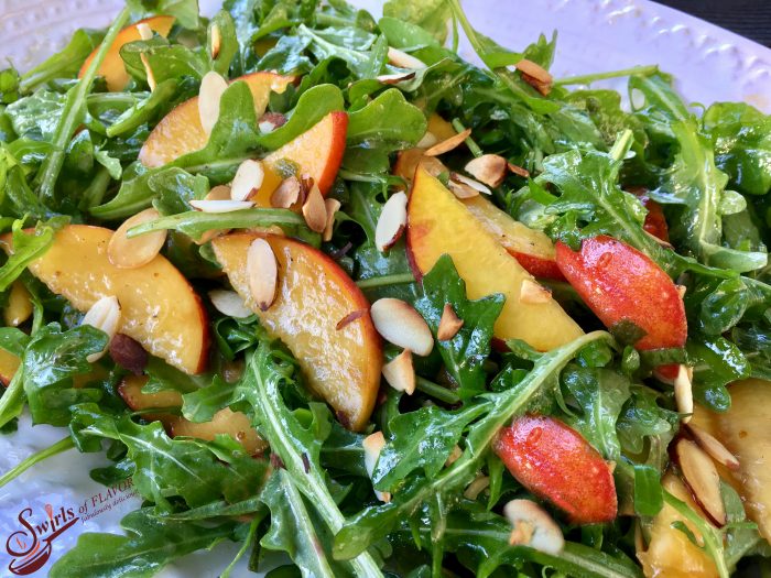 Peach Arugula Salad With Basil Mint Vinaigrette is bursting with summer flavors of juicy peaches, fragrant basil and fresh mint! peach | almonds | salad | arugula | basil | mint | vinaigrette